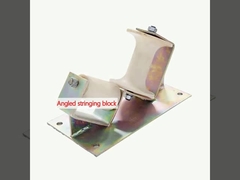 Angled stringing block